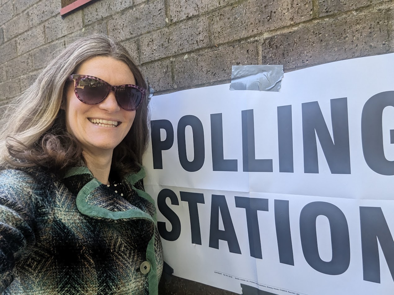 Nicola Smith next to polling station sign
